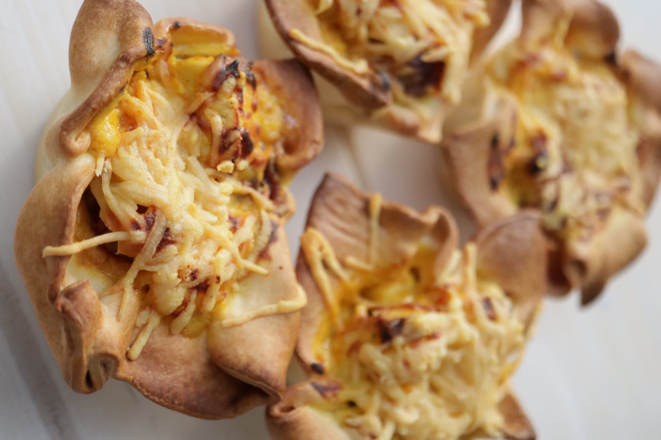 Mini quiches met pittige kip